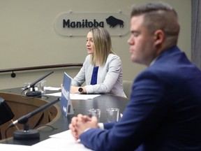 Dr. Joss Reimer (left), medical lead of the vaccine task force, speaks during a COVID-19 vaccination briefing at the Manitoba Legislative Building in Winnipeg on Wed., April 21, 2021. Co-lead Johanu Botha is at right. KEVIN KING/Winnipeg Sun/Postmedia Network
