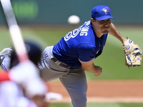 Toronto Blue Jays starting pitcher Ross Stripling delivers a pitch against the Cleveland Indians at Progressive Field.