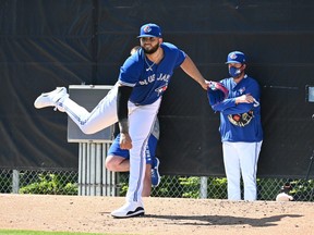 Big right-hander Alek Manoah, ranked as the No. 5 prospect on the Blue Jays by MLB Pipeline, limbers up during the team’s training camp in Dunedin yesterday.