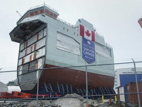 The centre block of the future HMCS Max Bernays is moved from the fabrication building to dockside at the Irving Shipbuilding facility in Halifax, Jan. 22, 2021.