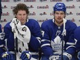 Maple Leafs' Mitch Marner (left) and Auston Matthews (centre) take a break during a stoppage in play in the third period against the Montreal Canadiens at Scotiabank Arena.