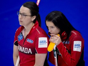 Team Canada skip Kerri Einarson (right) and third Val Sweeting look on during Draw 20 against Team Japan at the World Woman's Curling Championship in Calgary on Thursday, May 6, 2021.