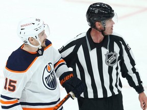 Edmonton Oilers forward Josh Archibald speaks with Winnipeg Jets defenceman Logan Stanley after he hit him low and was penalized in Game 3 of a Stanley Cup playoff series in Winnipeg on Sunday, May 23, 2021.