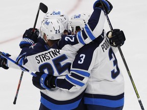 Winnipeg Jets forward Paul Stastny (25) celebrates his overtime winning goal against the Edmonton Oilers in Game two of the first round of the 2021 Stanley Cup Playoffs at Rogers Place in Edmonton on May 21, 2021.