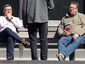 Conversation at a distance on Broadway in Winnipeg on Wed., May 5, 2021. KEVIN KING/Winnipeg Sun/Postmedia Network