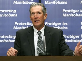 Premier Brian Pallister gestures during a press briefing at the Manitoba Legislative Building in Winnipeg on Monday, May 10, 2021.