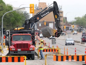 Road construction work on Portage Avenue in Winnipeg on Wednesday, May 19, 2021.