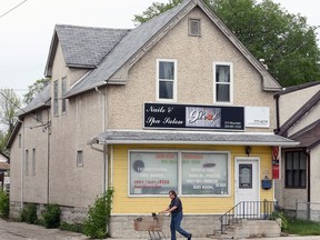A vacant commercial property on Mountain Avenue in Winnipeg on Thursday, May 20, 2021 which Raising the Roof has chosen as its first renovation project outside Ontario. The building is expected to have three living units with three beds each to house Indigenous women and their children.