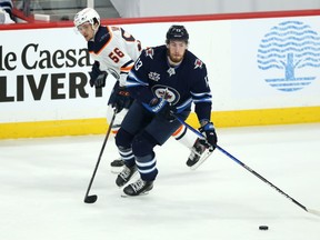 Winnipeg Jets centre Pierre-Luc Dubois carries the puck against the Edmonton Oilers in Game 3 of a Stanley Cup playoff series in Winnipeg on Sunday, May 23, 2021.