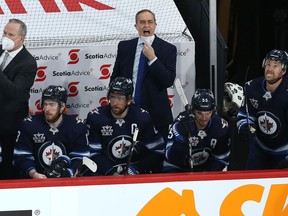 Winnipeg Jets head coach Paul Maurice yells to his player in the penalty box during Game 4 of a Stanley Cup playoff series against the Edmonton Oilers in Winnipeg on Mon., May 24, 2021.