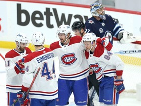 Montreal Canadiens centre Eric Staal (centre) celebrates his goal during Game 1 of the North Division final against the Winnipeg Jets in Winnipeg on Tuesday