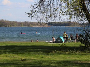 People enjoy the warm weather at Lakeview Waterfront Park in Lakeview Heights, Ont., May 14, 2021.
