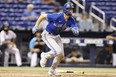 Cavan Biggio of the TorontBlue Jays hits a double during the ninth inning against the Miami Marlins. MICHAEL REAVES/USA TODAY SPORTS