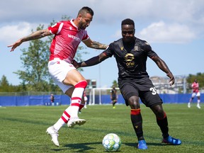 Cavalry FC Marcus Haber (left) is marked by Valour FC’s Andrew Jean-Baptiste during Canadian Premier League Island Games in Charlottetown last year.