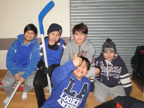 Students at Kistiganwacheeng Elementary School in Garden Hill First Nation pose while taking part in a floor hockey game in February of 2020, just one month before the school was shut down because of the COVID-19 pandemic.
Handout