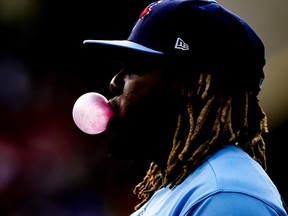 HOUSTON, TEXAS - MAY 08: Vladimir Guerrero Jr. #27 of the Toronto Blue Jays blows a bubble against the Houston Astros at Minute Maid Park on May 08, 2021 in Houston, Texas. (Photo by Carmen Mandato/Getty Images)