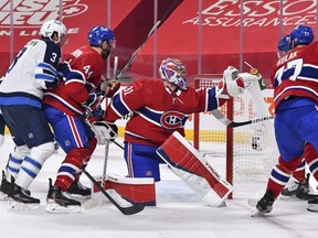 Montreal goaltender Carey Price makes a glove save against the Jets last night.  Getty Images