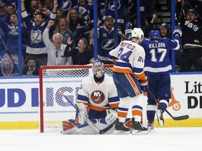 Tampa Bay Lightning left wing Alex Killorn celebrates as he scores a goal on New York Islanders goaltender Ilya Sorokin during the second period in Game 5 of the Stanley Cup semifinals at Amalie Arena in Tampa, Fla., June 21, 2021.