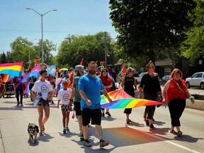 Chris Plett, the chairperson for the Steinbach Pride Committee, leads a group of marchers during a past Pride event in Steinbach. The Steinbach Pride Committee will host the 2022 Steinbach Pride event this Sunday. Photo submitted