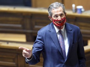 Premier Brian Pallister gestures in the Manitoba Legislature during the final sitting of the first legislative session of the year in Winnipeg on Tuesday, June 2, 2021.