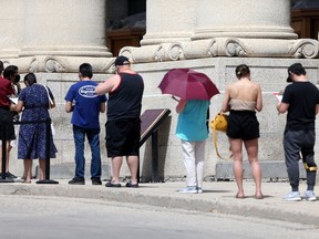 Activity near a Covid-19 vaccination clinic, in Winnipeg.   Friday, June 4, 2/2021.Winnipeg Sun/Chris Procaylo/stf