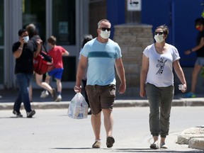 Activity near the entrance to a shopping mall, in Winnipeg on Saturday, June 12, 2021.