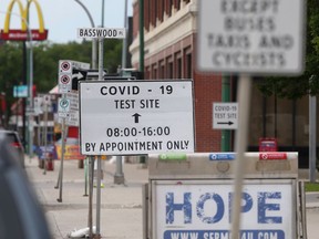 A sign for a COVID-19 test site, in Winnipeg on Friday, June 25, 2021.