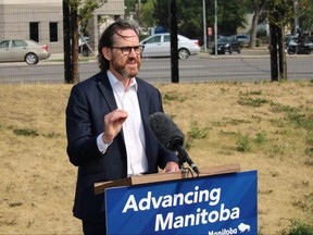 Dr. James Bolton, medical director of crisis response services with Shared Health speaks with media about new mental health resources on Friday.