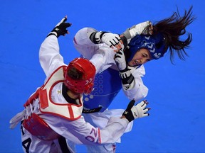 Winnipegger Skylar Park (right) compete in the Taekwondo Women's Under 57kg Final during the Pan-American Games Lima 2019, in Lima, on July 28, 2019 where Park took silver.
