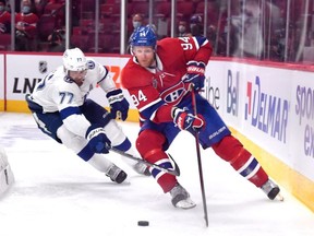 Victor Hedman #77 of the Tampa Bay Lightning defends Corey Perry #94 of the Montreal Canadiens during the third period in Game Three of the 2021 NHL Stanley Cup Final at Bell Centre on July 02, 2021 in Montreal, Quebec, Canada.