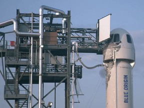 This still image taken from video by Blue Origin shows the launch pad as Mark Bezos, Jeff Bezos, Wally Funk and Oliver Daemen wait for take off to travel for the first crewed flight of Blue Origin's reusable New Shepard craft, on July 20, 2021, in Van Horn, Texas.