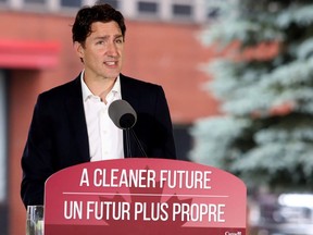 Prime Minister Justin Trudeau speaks after touring the Algoma Steel plant in Sault Ste. Marie, Ontario, July 5, 2021. (Gino Donato/Pool via REUTERS)