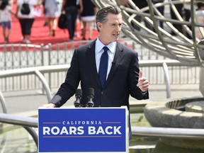 In this file photo taken on June 15, 2021, California Governor Gavin Newsom speaks at a press conference to discuss the state reopening at Universal Studios in Hollywood, California.