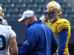Quarterback Matt Nichols shares a laugh with offensive co-ordinator Paul LaPolice during their Winnipeg days together. The two have been re-united in Ottawa this coming season.