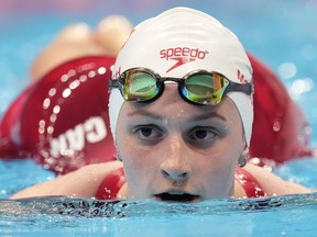 Summer McIntosh of Canada reacts following the women's 400m freestyle heats at the Olympics in Tokyo on July 25, 2021.