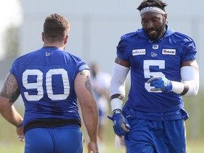 Willie Jefferson (right) during training camp for the CFL football team in Winnipeg on Saturday, July 10, 2021.