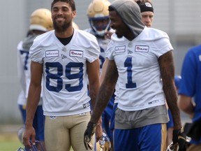 Kenny Lawler (let) and Darvin Adams during training camp for the CFL football team in Winnipeg on Tuesday, July 13, 2021.