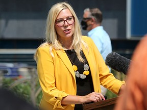 Families Minister Rochelle Squires speaks during a press conference for a one-year update on the Downtown Community Safety Partnership, in Millennium Library Park in Winnipeg, on Tuesday, July 27, 2021. Squires says she won't be entering the race to be Winnipeg's mayor.