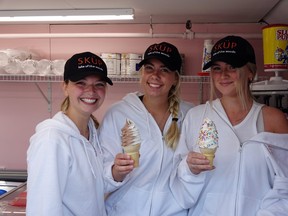 From left: Roxy McFadden, Brynn Psooy and Lauren Douthart show off some of the ice cream cones available at Kenora's newest ice cream parlour on Main Street. Bronson Carver/Miner and News