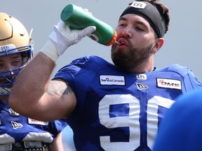 Blue Bombers' Casey Sayles takes a break at training camp.