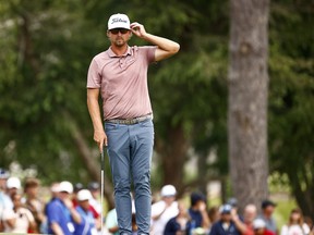 Roger Sloan of Canada looks on from the 18th green during the final round of the Wyndham Championship at Sedgefield Country Club in Greensboro, North Carolina. Sloan lost in a playoff.