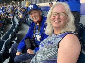 Laura McMaster called up the Bombers and explained that she’d need a wheelchair to get her father Ron, 90, to his seat. Last night, they attended the first unlimited-capacity sporting event in Canada since the start of the pandemic.  Paul Friesen/ Winnipeg Sun