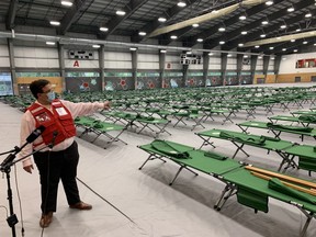 Jason Small of the Canadian Red Cross speaks with media at an emergency shelter set up at the University of Winnipeg on Thursday. James Snell/Postmedia