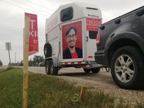 Damaged campaign sign with a broken piece of vehicle bumper nearby on the ground, near Oakbank, Man. Trevor Kirczenow, Liberal candidate for the Manitoba federal riding of Provencher, told the Winnipeg Sun on Monday he’s seeing more campaign sign theft and vandalism compared to the last federal election in 2019.