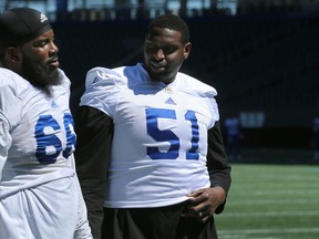 Jermarcus Hardrick (right) and Stanley Bryant once again anchor the formidable Blue Bombers offensive line.