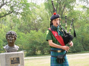 Calum McKinnon, 17, of the Lord Selkirk Robert Fraser Memorial Pipe Band plays the bagpipes as the St. Andrew Society of Winnipeg kicked off its Pop-up-Piper performance series to mark Terry Fox Day beside a bust of Terry Fox, located along the Winnipeg
Real Estate Board Citizens' Hall of Fame near the Assiniboine Park Conservancy Outdoor Gardens at The Leaf on Terry Fox Day Monday, Aug. 2, 2021. After playing beside the bust of Terry Fox, he walked towards the Leaf, where he played the pipes for all in attendance. The Pop-up-Piper kicks off its series of August and September mini-concerts with the performance. Future dates of Pop-up-Piper performances to be announced soon.
"Terry Fox is one of Winnipeg's most famous sons, and this year marks the 40th anniversary of his passing, "said St. Andrew Society President Andrew Flook. "Few people have ever had such a positive and profound impact on the world, and we felt it was important to honour and celebrate Terry Fox Day in Manitoba."