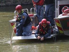 Winnipeg Fire Paramedic Service Water Rescue crews search the Red River near The Forks on Friday, Aug, 6, 2021, after responding to reports of an individual in the water. Witnesses saw the individual go under the water without resurfacing. WFPS Water Rescue crews initiated a search mission for the missing individual, aided by the Winnipeg Police Service River Patrol. At approximately 2:40 p.m. the individual was located deceased.