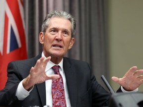 Premier Brian Pallister gestures during a COVID-19 update at the Manitoba Legislative Building in Winnipeg on Mon., Aug. 23, 2021.