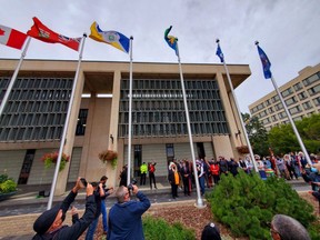 Representatives from the Dakota Nations, Metis Nation and Treaty One First Nations gathered at Winnipeg city hall on Wednesday to permanently raise their flags.  James Snell/Winnipeg Sun