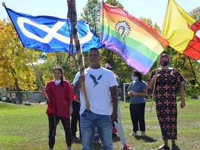 A flag ceremony is held during the Mini Pop-Up 2S Powwow on the grounds of the Broadway Neighbourhood Centre in Winnipeg on Wednesday, Sept. 22, 2021. Dave Baxter/Winnipeg Sun